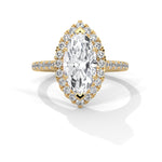 Gold ring with a large central diamond and smaller diamonds around on a white background 