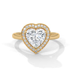 Gold ring with a diamond on a white background 