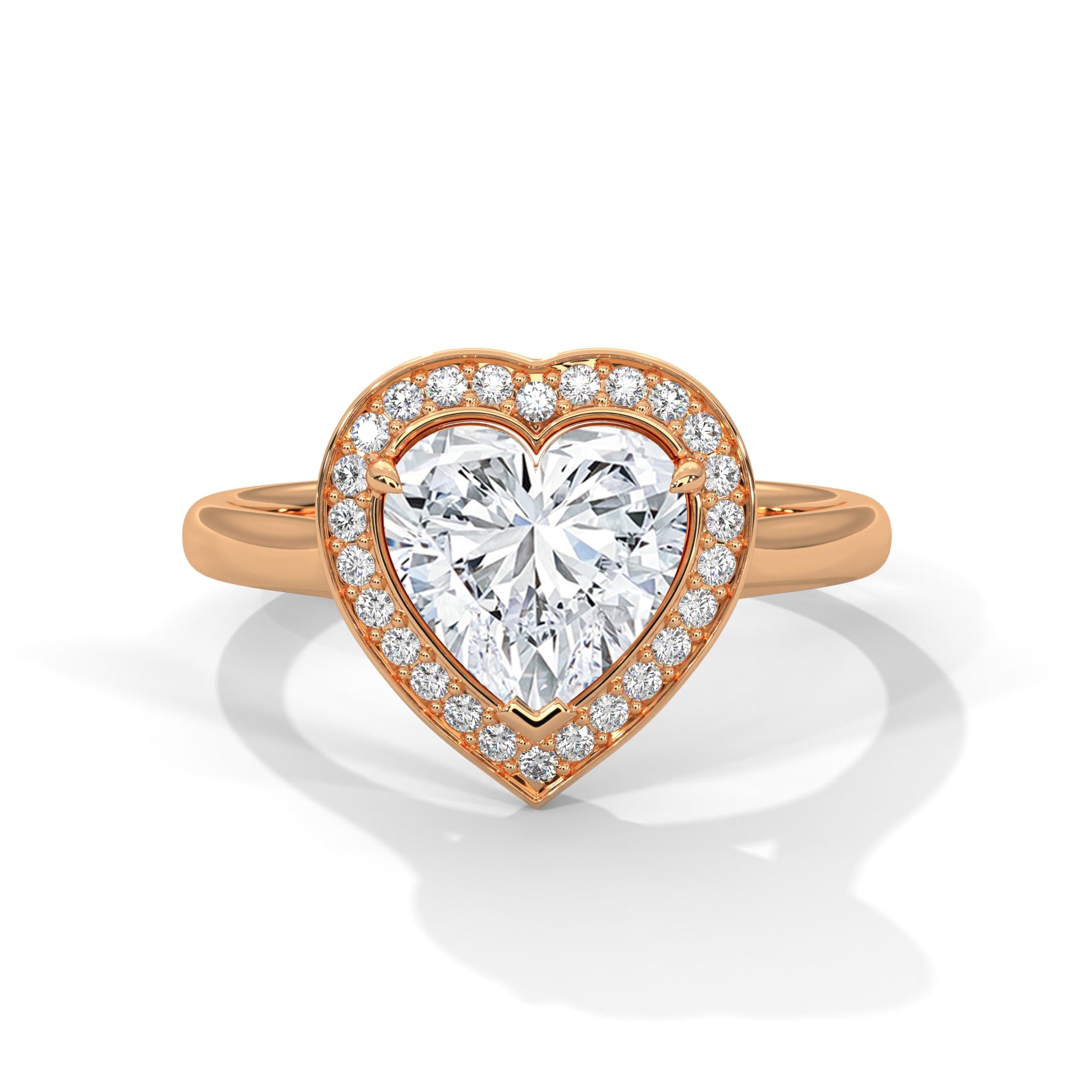 Heart-shaped diamond ring with rose gold band on a white background #rose-gold