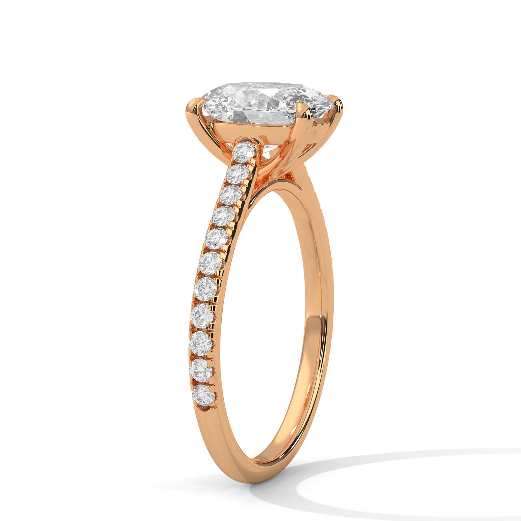 Rose gold ring with a large diamond on a white background 