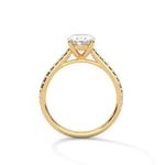 Gold ring with a large diamond on a white background 
