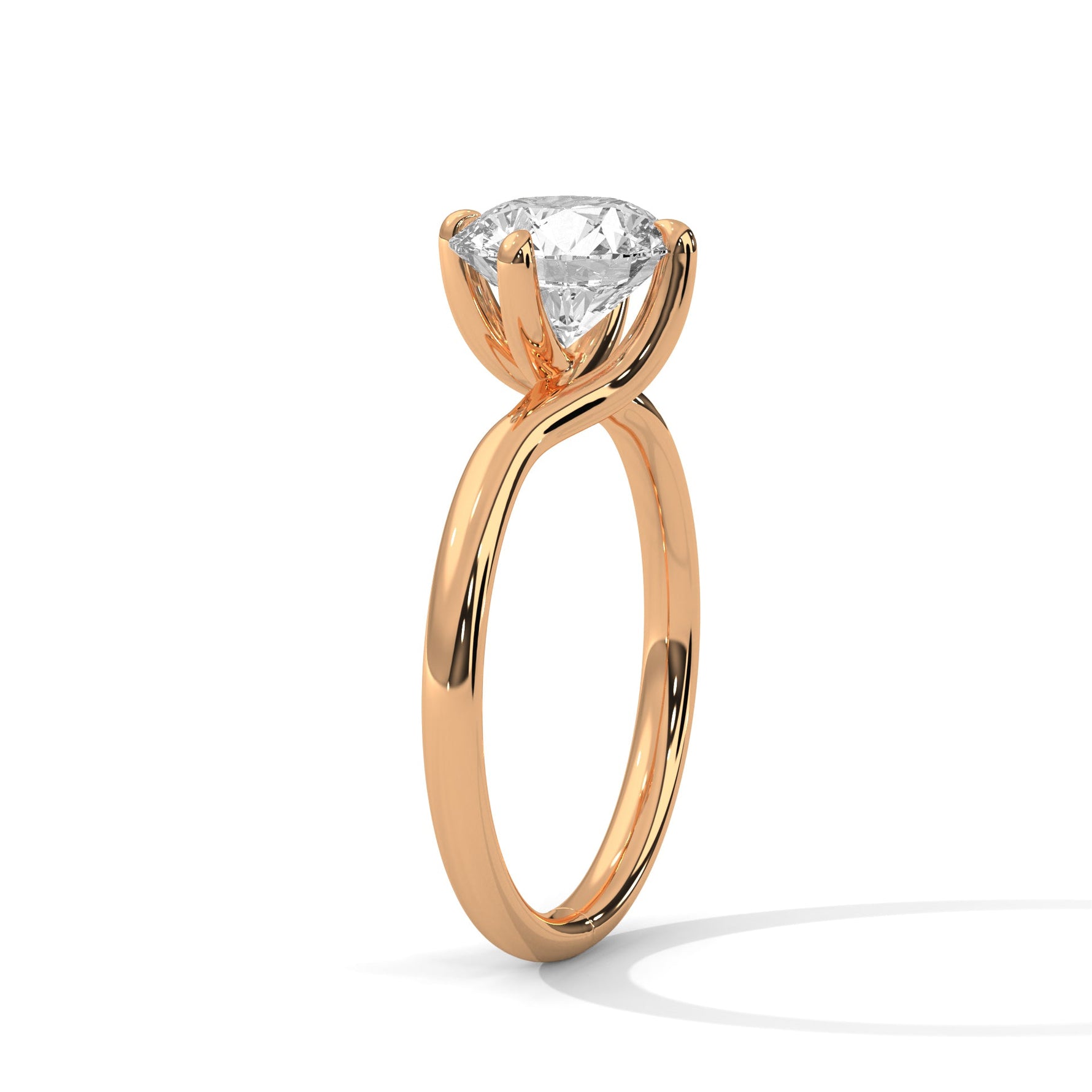 Rose gold ring with a large diamond on a white background 