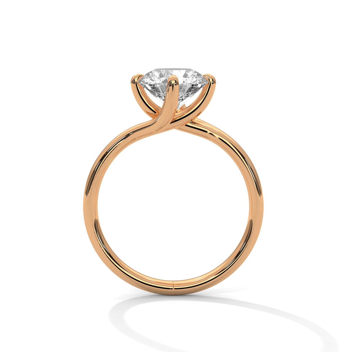 Rose gold ring with a large diamond on a white background 