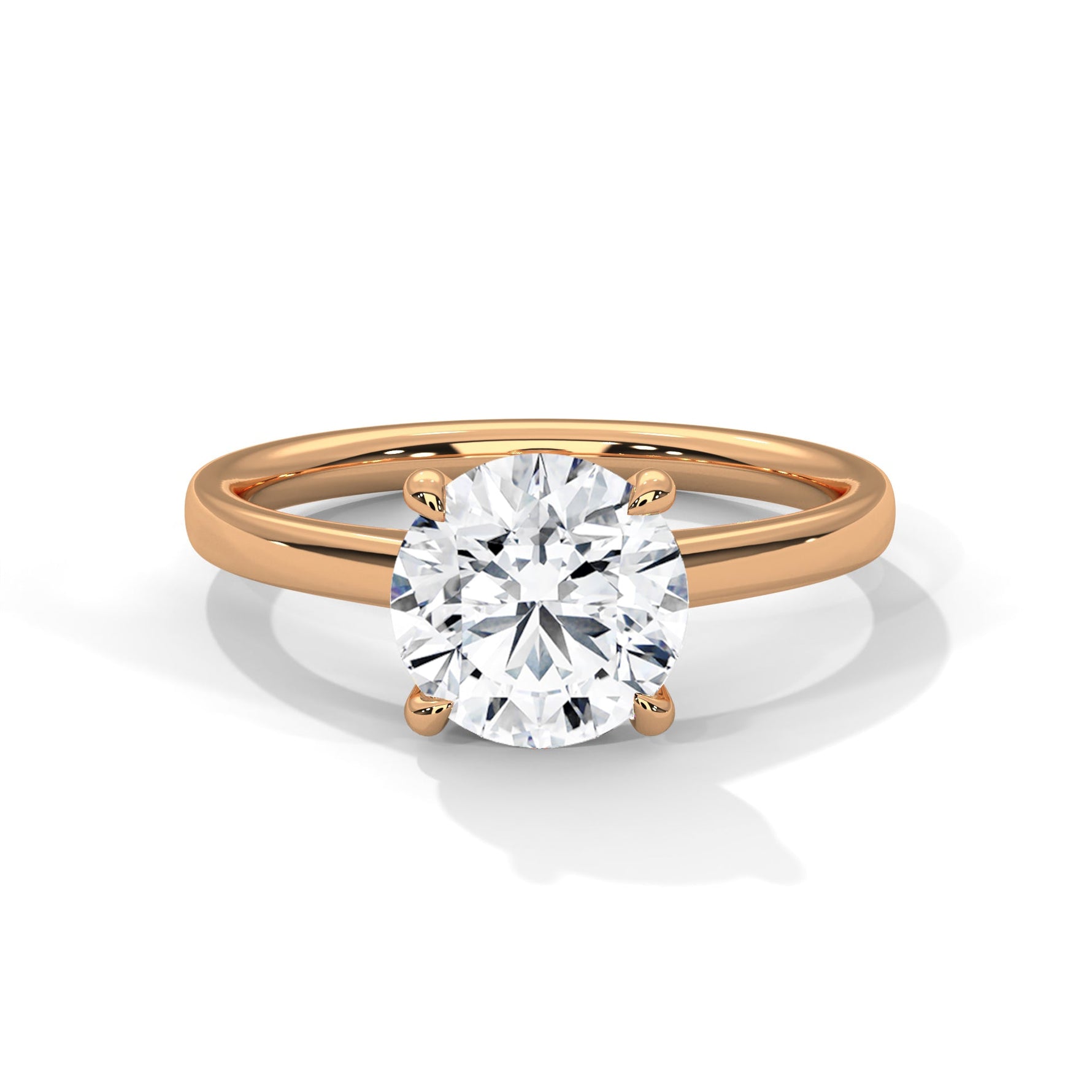 Rose gold ring with a large diamond on a white background #rose-gold
