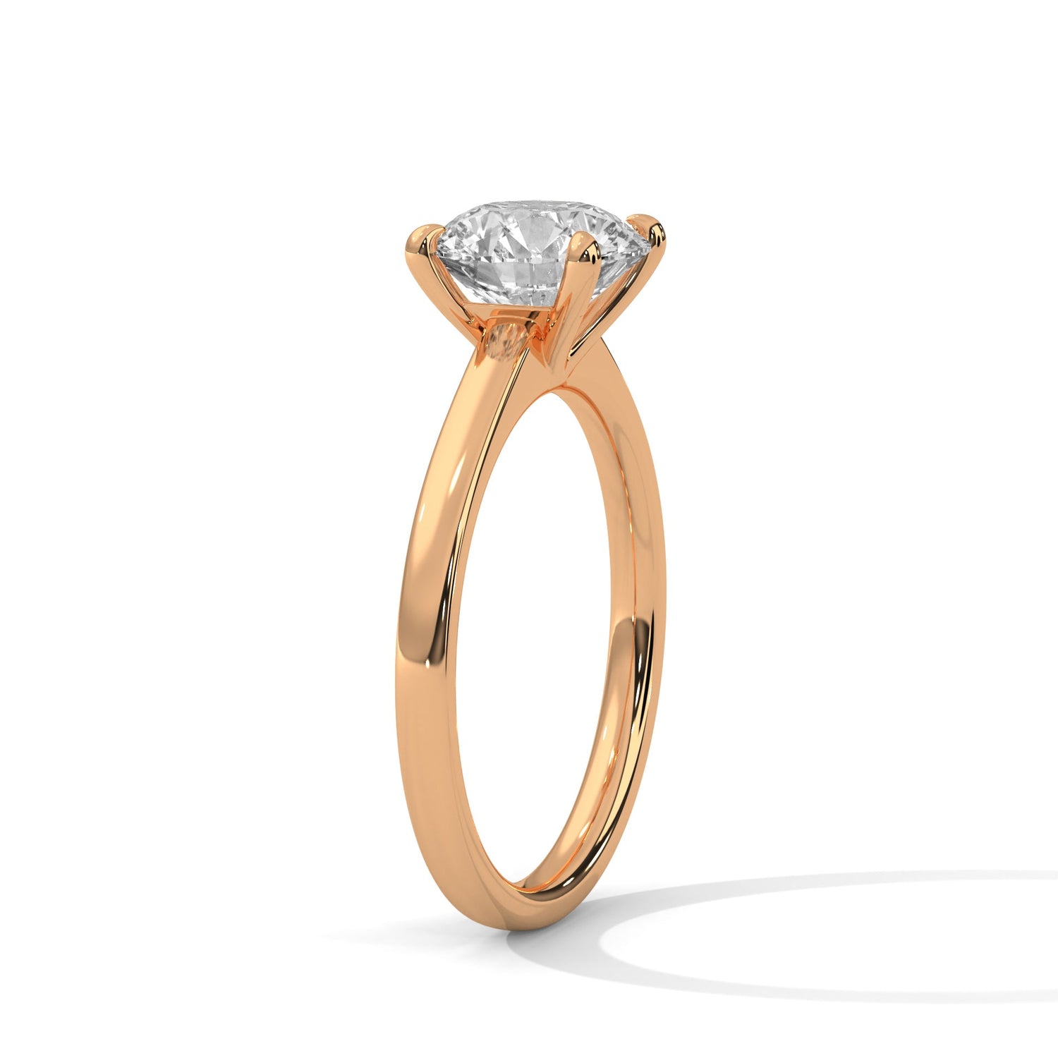 Rose gold ring with a large diamond on a white background 