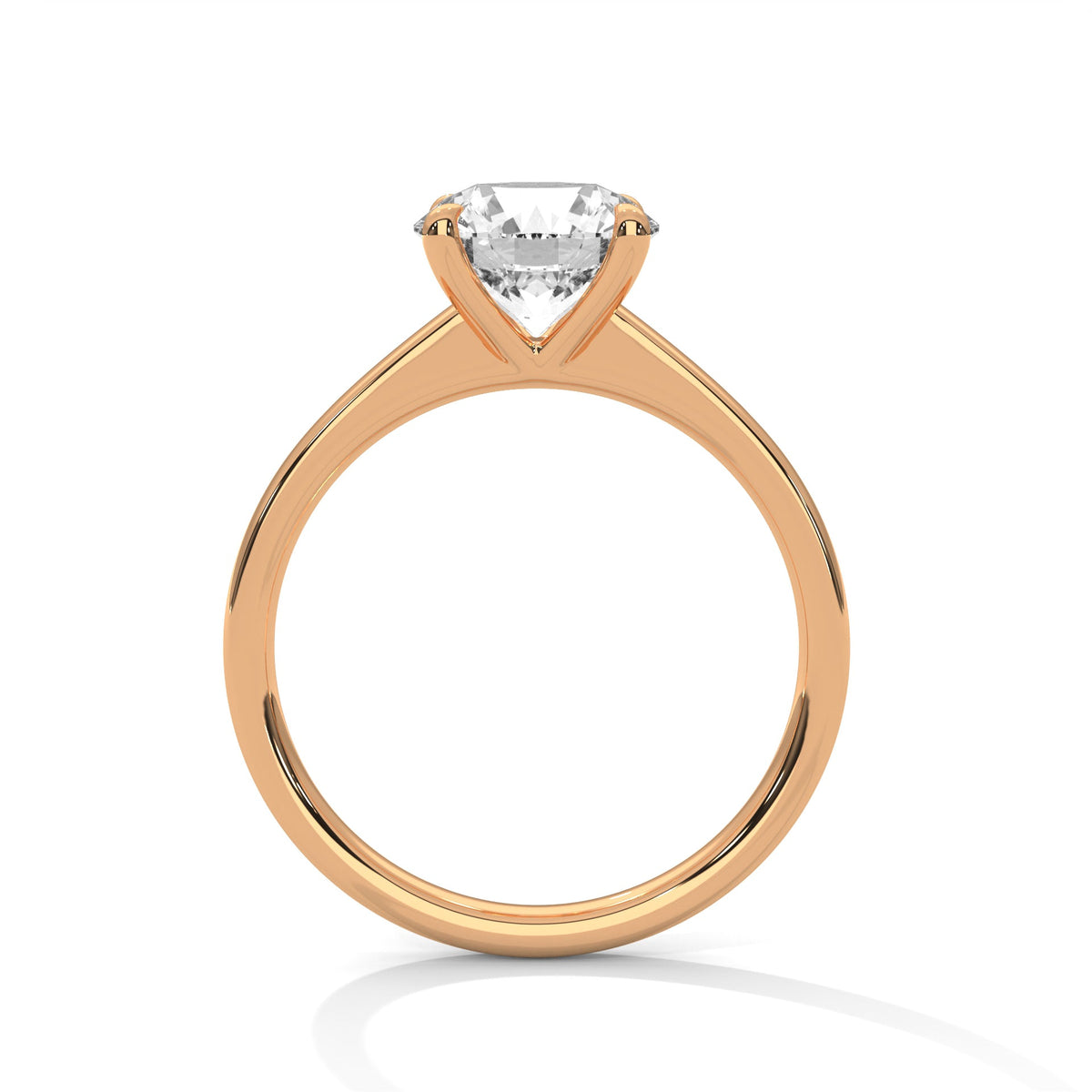 Rose gold ring with a large diamond on a white background 