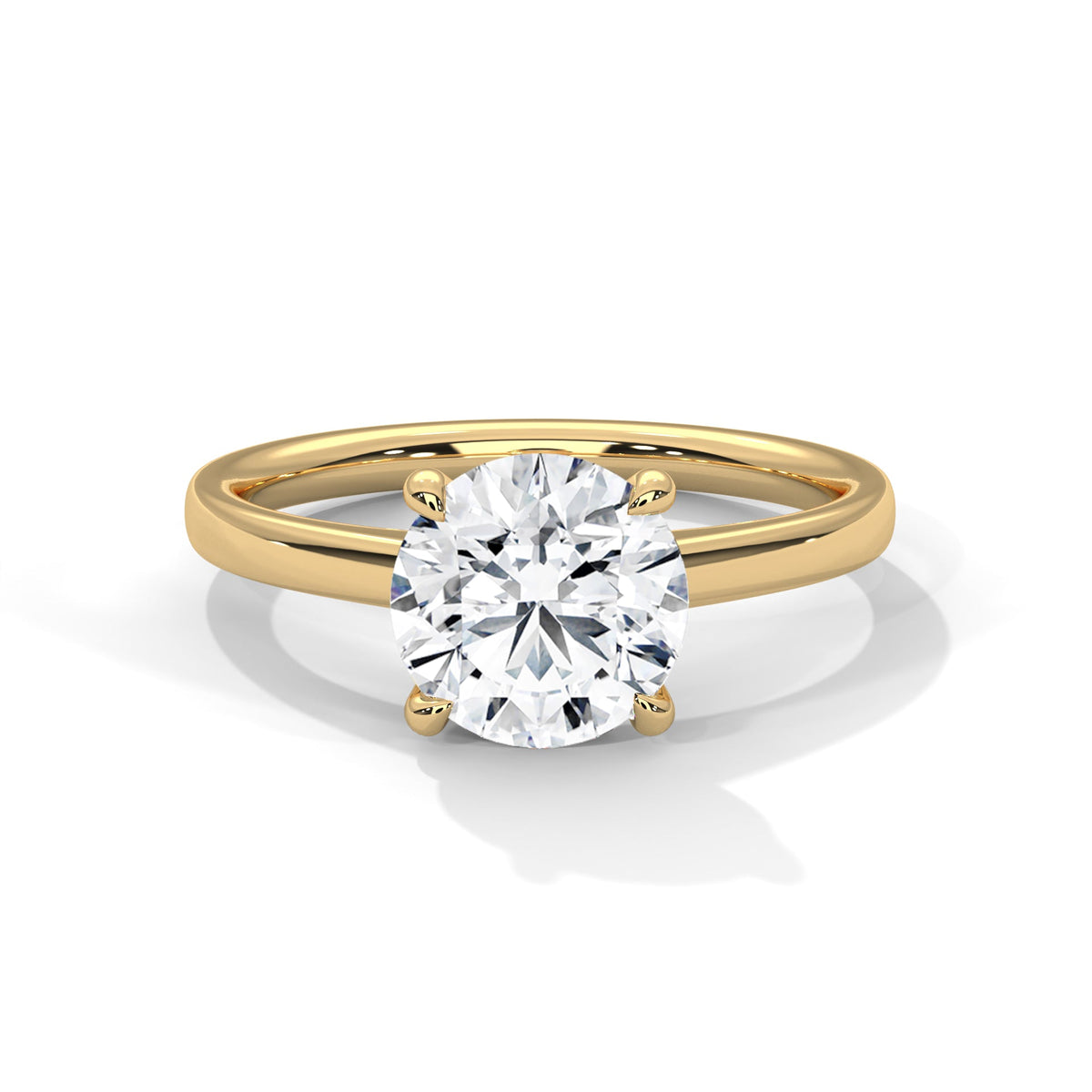 Gold ring with a large diamond on a white background 