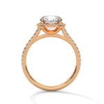 Rose gold ring with a large diamond on a white background 