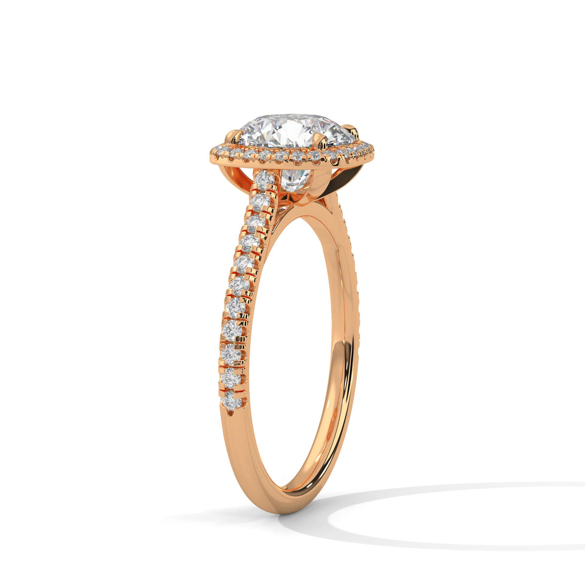 Rose gold ring with a large diamond on a white background 