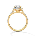 Gold ring with a large diamond on a white background 