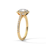 Gold ring with a large diamond on a white background 