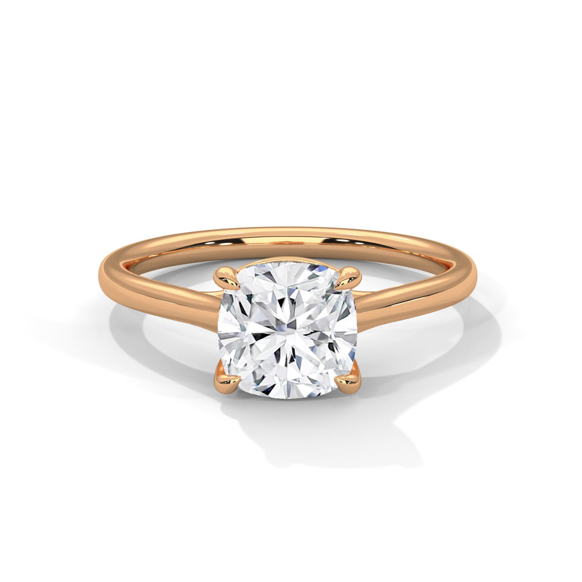 Rose gold ring with a large diamond on a white background 