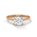 Rose gold ring with a large diamond on a white background 