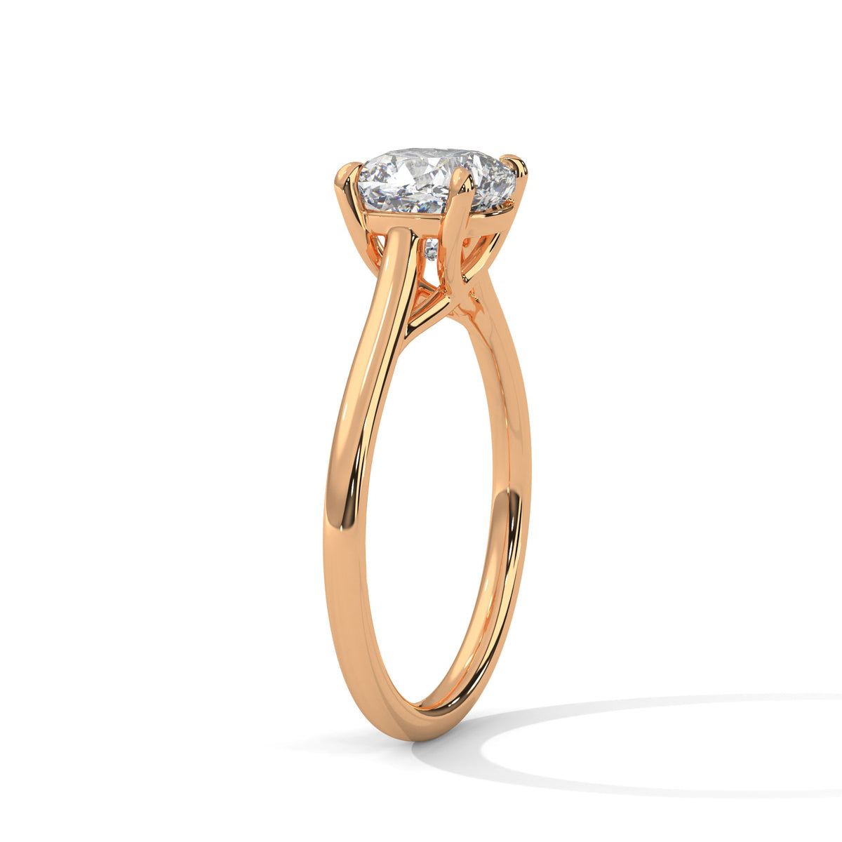 Rose gold ring with a large diamond on a white background 