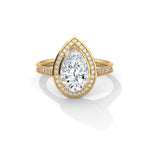 Gold ring with a large diamond on a white background 