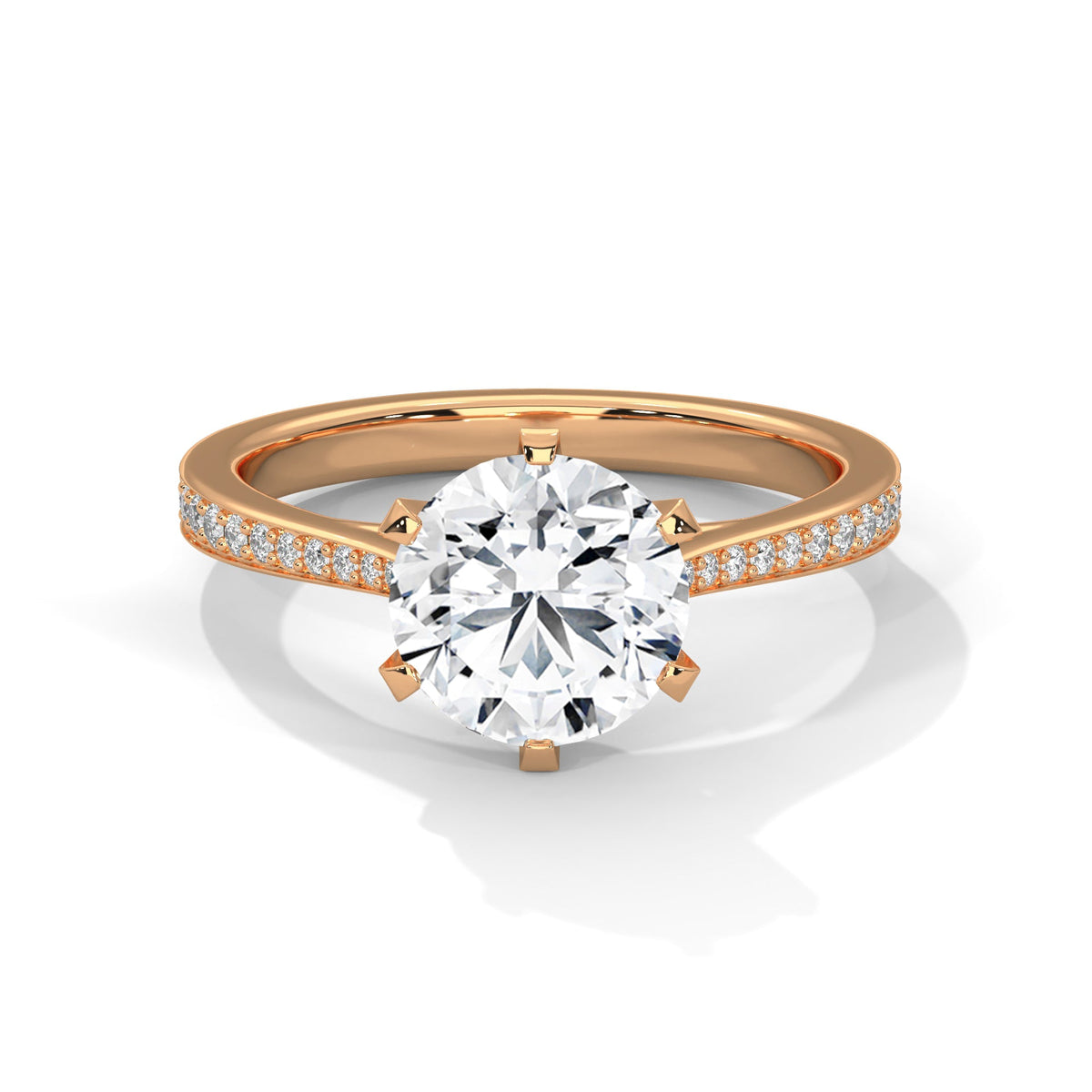 Rose gold ring with a large diamond on a white background 