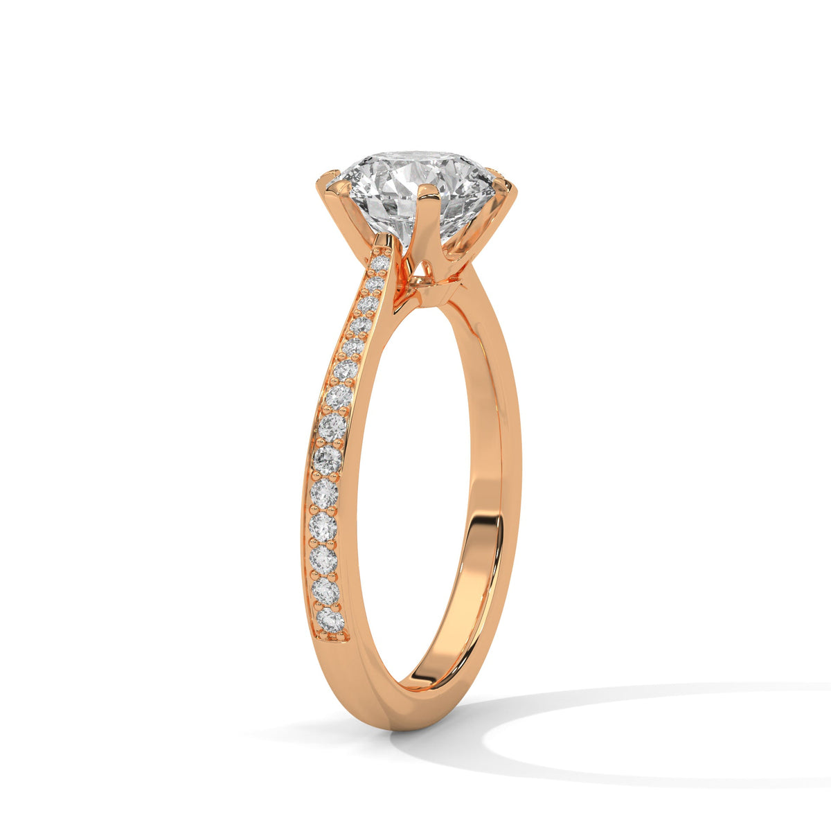 Rose gold ring with a large diamond on a white background 