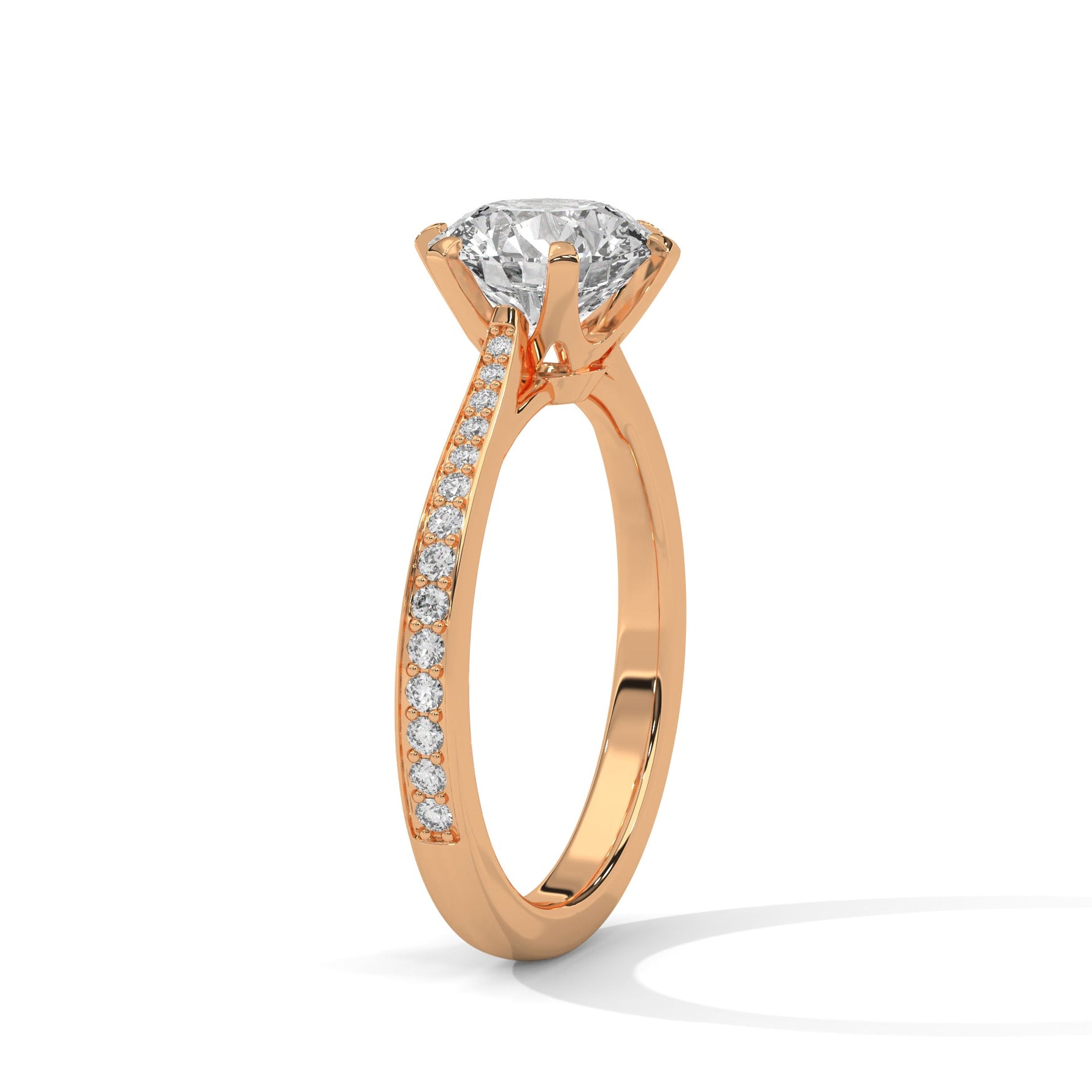 Rose gold ring with a large diamond on a white background 