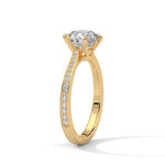Gold ring with a large diamond on a white background 