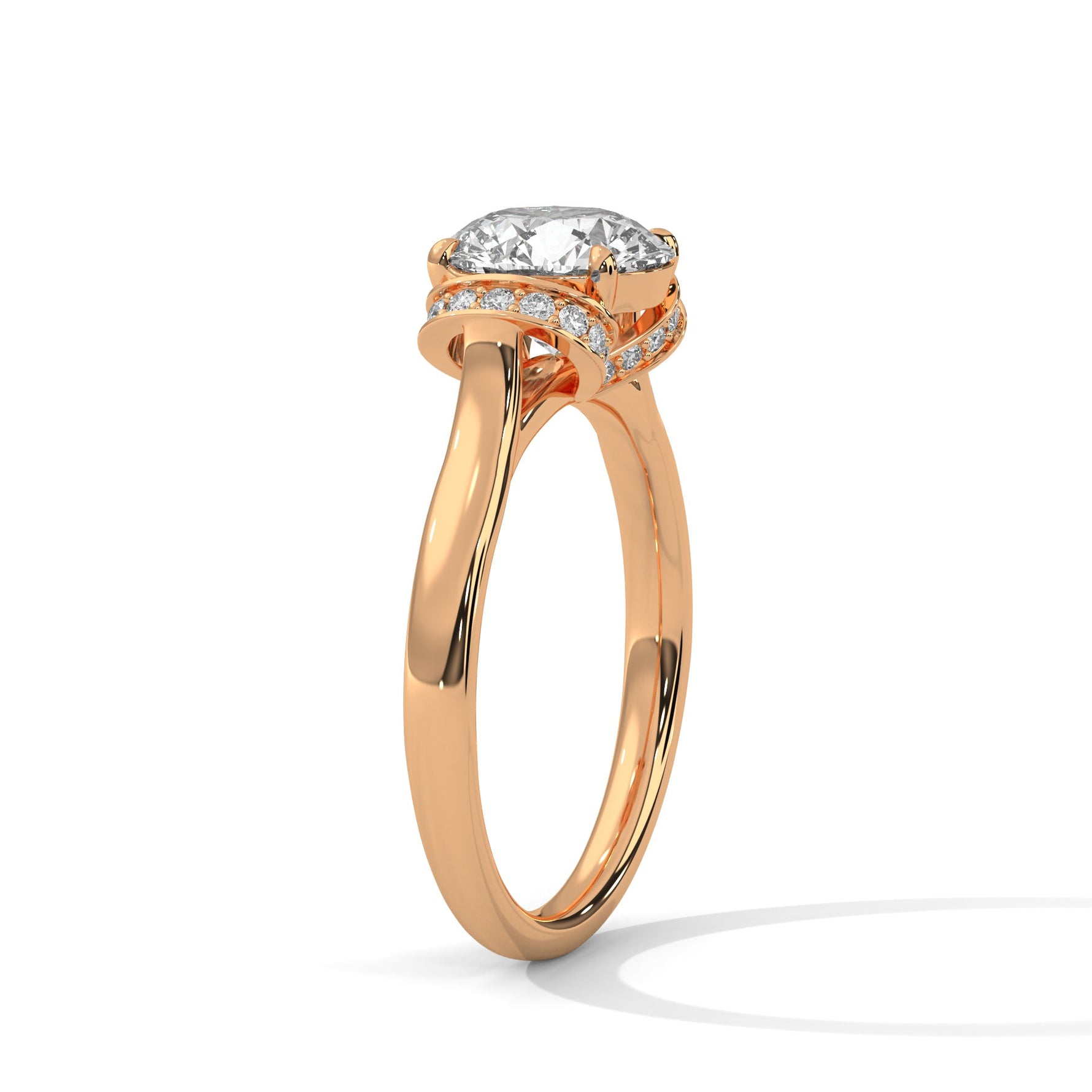 Rose gold ring with a large diamond on a white background 