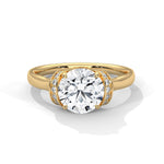 Gold ring with a large diamond on a white background 