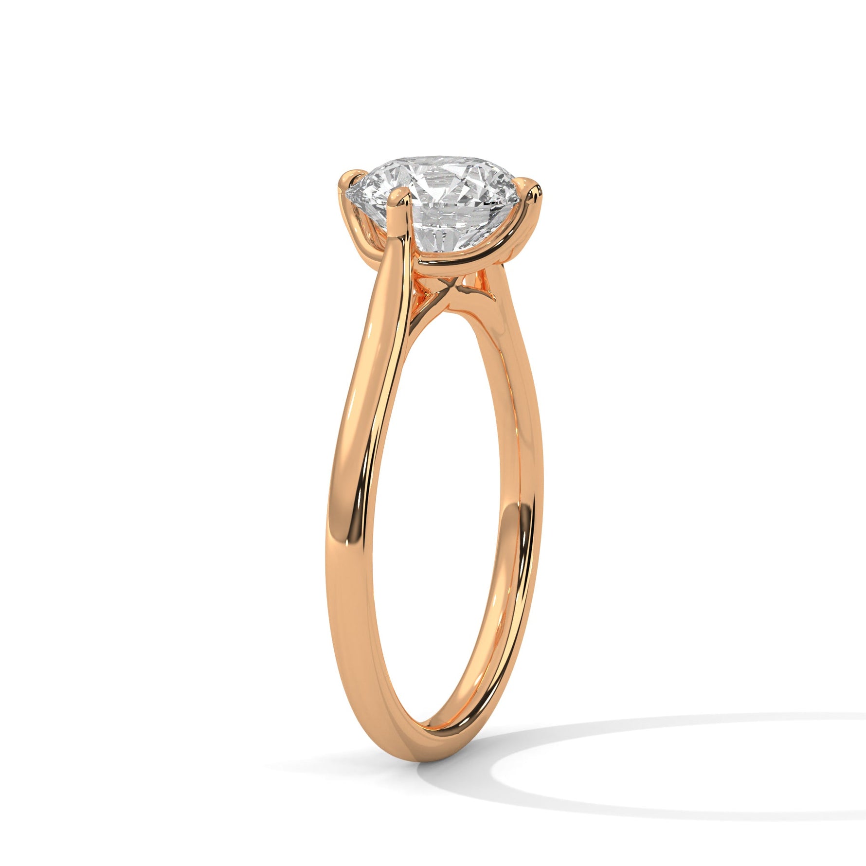 Rose gold ring with a large diamond on a white background 