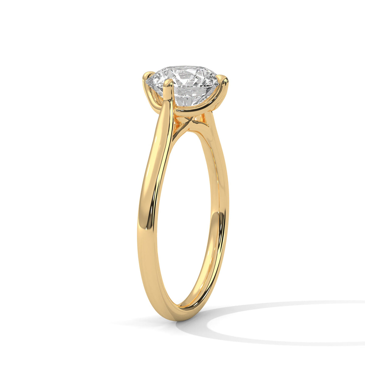 Gold ring with a large diamond on a white background 