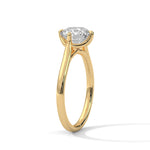 Gold ring with a large diamond on a white background 
