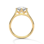 Gold ring with a large diamond on a white background 