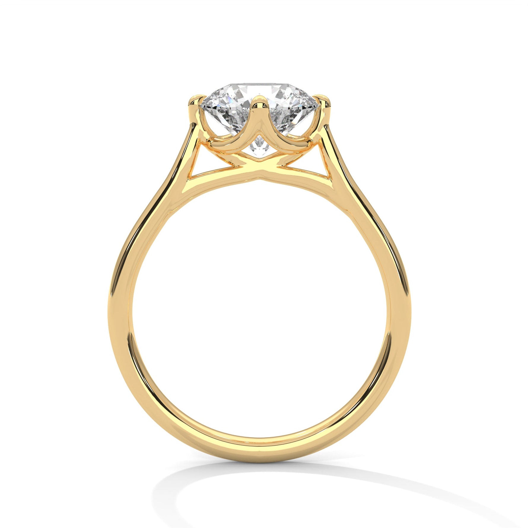 Gold ring with a large diamond on a white background 