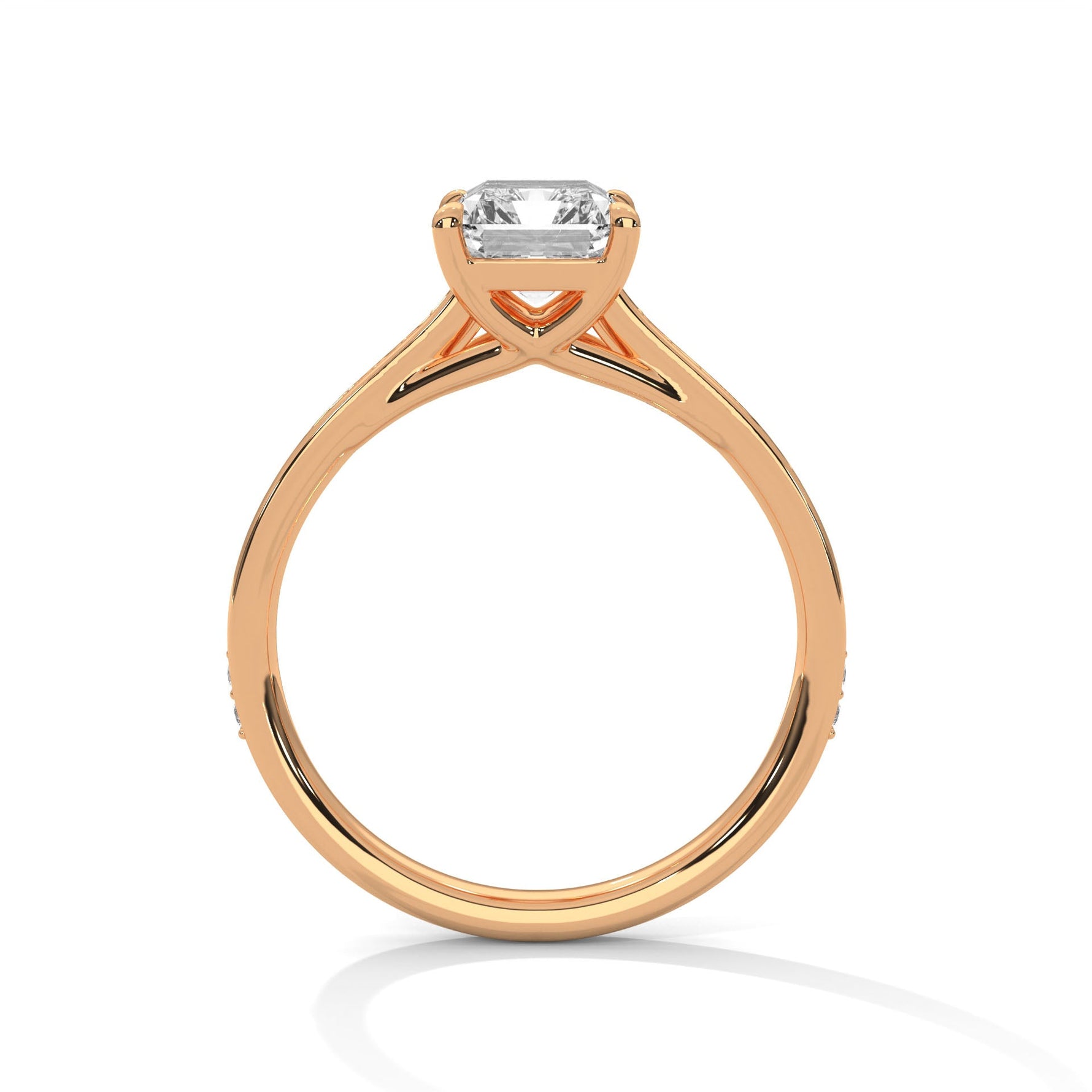Rose gold ring with a large diamond on a white background 