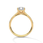 Gold ring with a large diamond on a white background 
