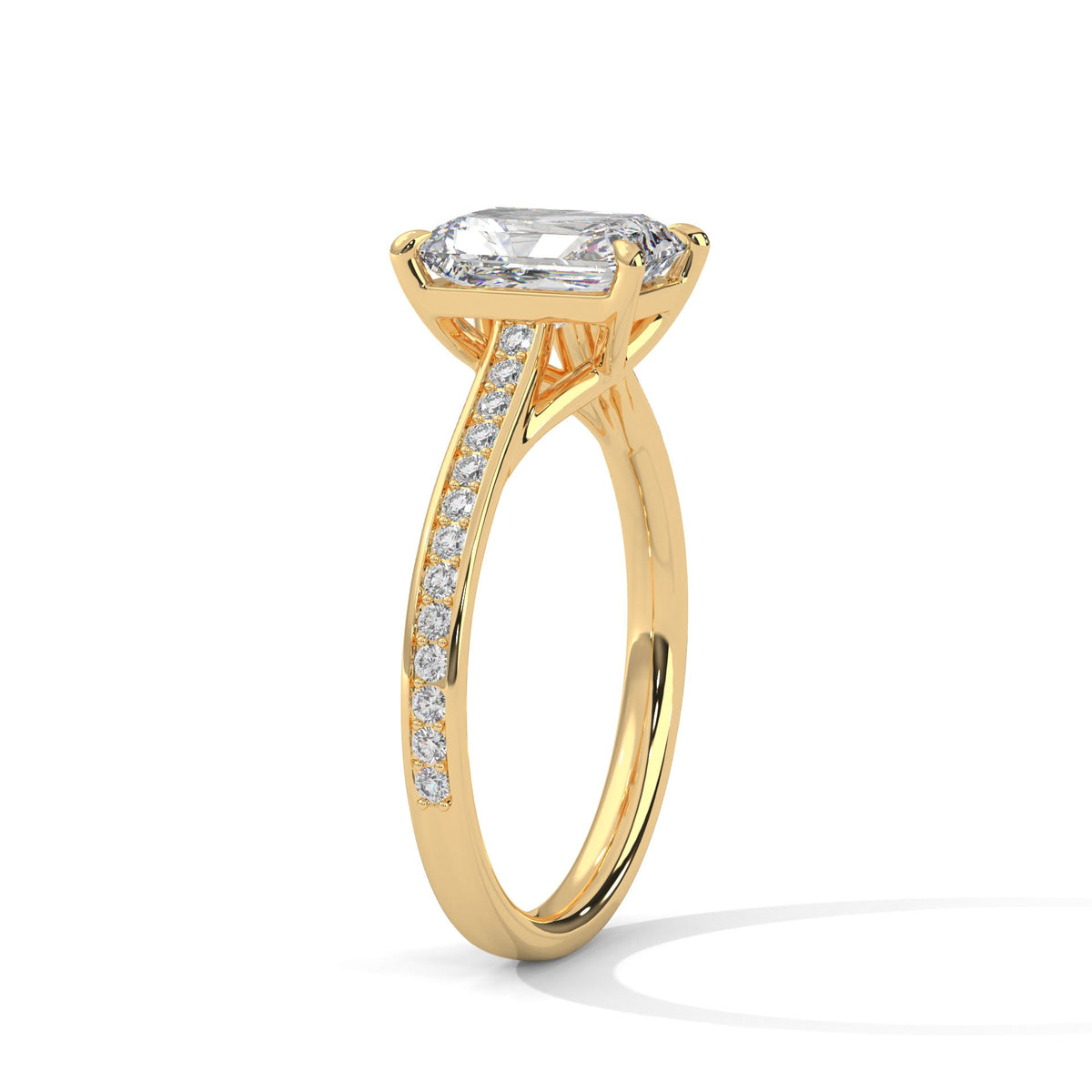 Gold ring with a large diamond on a white background 