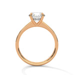 Rose gold ring with a large diamond on a white background 