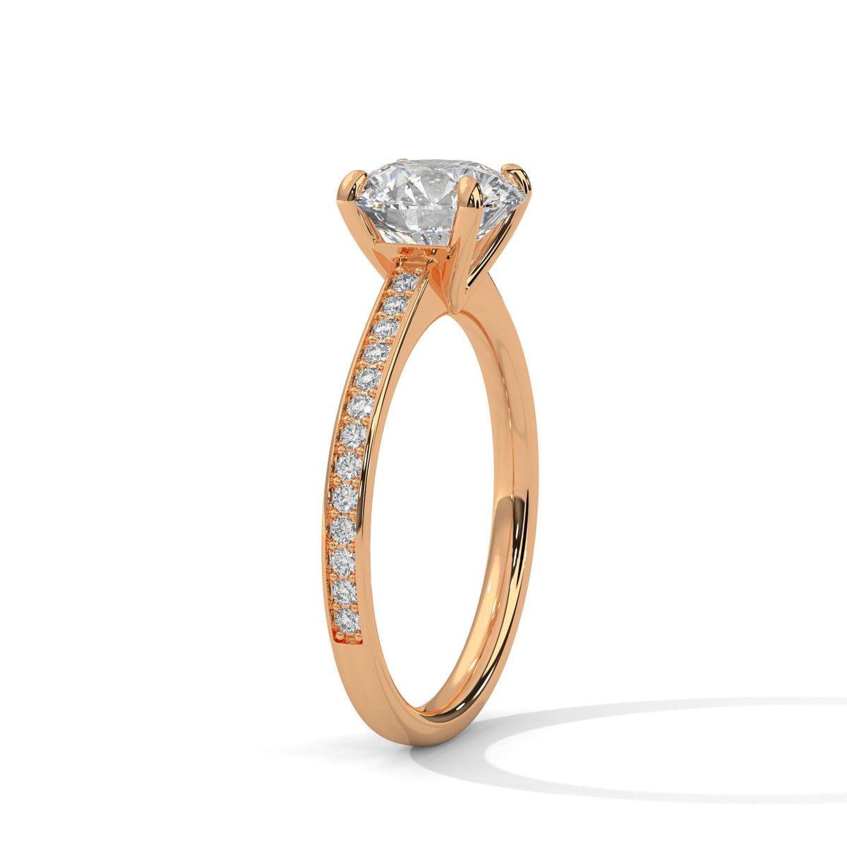 Rose gold ring with a large diamond on a white background 