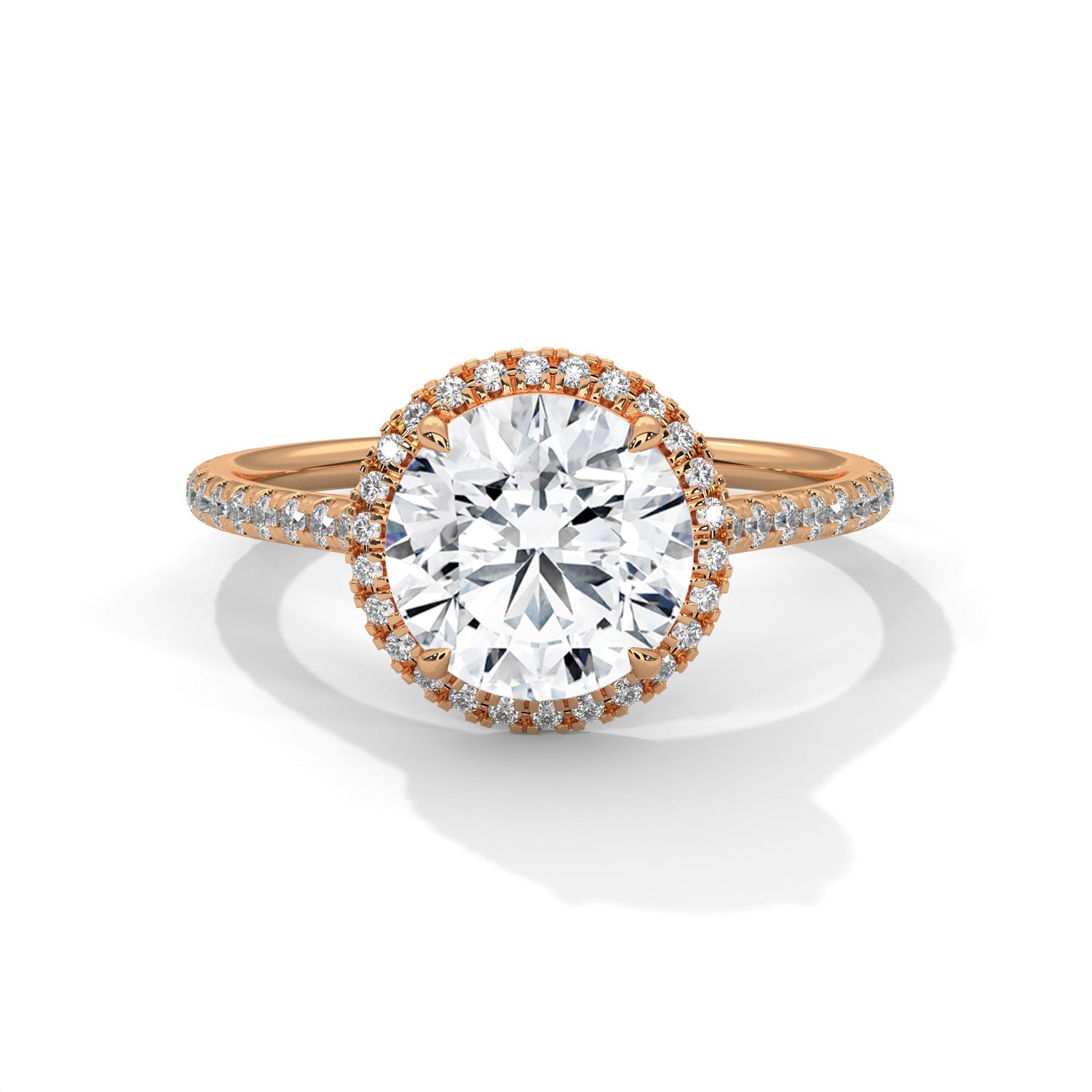 Rose gold ring with a large diamond on a white background 