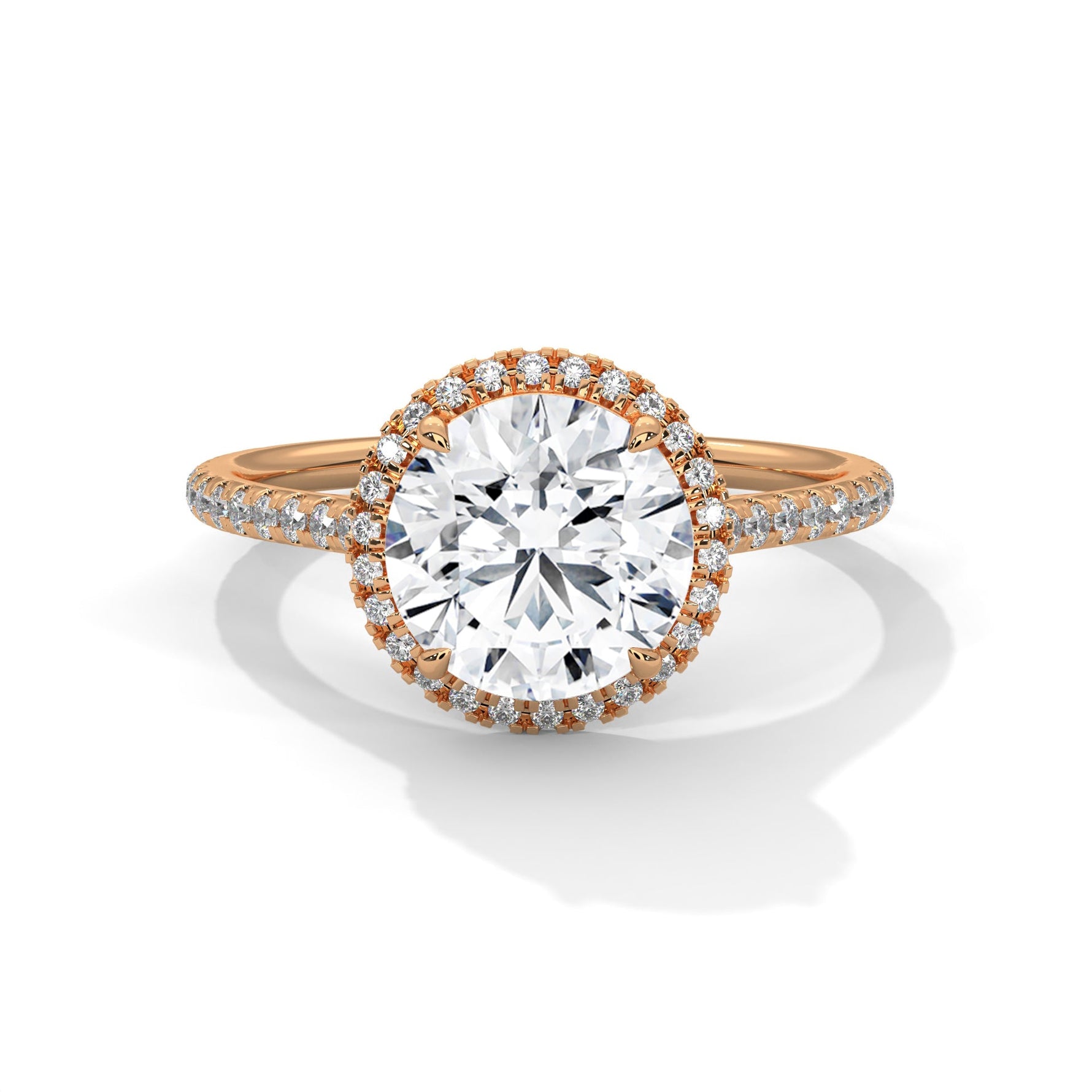 Rose gold ring with a large diamond on a white background #rose-gold