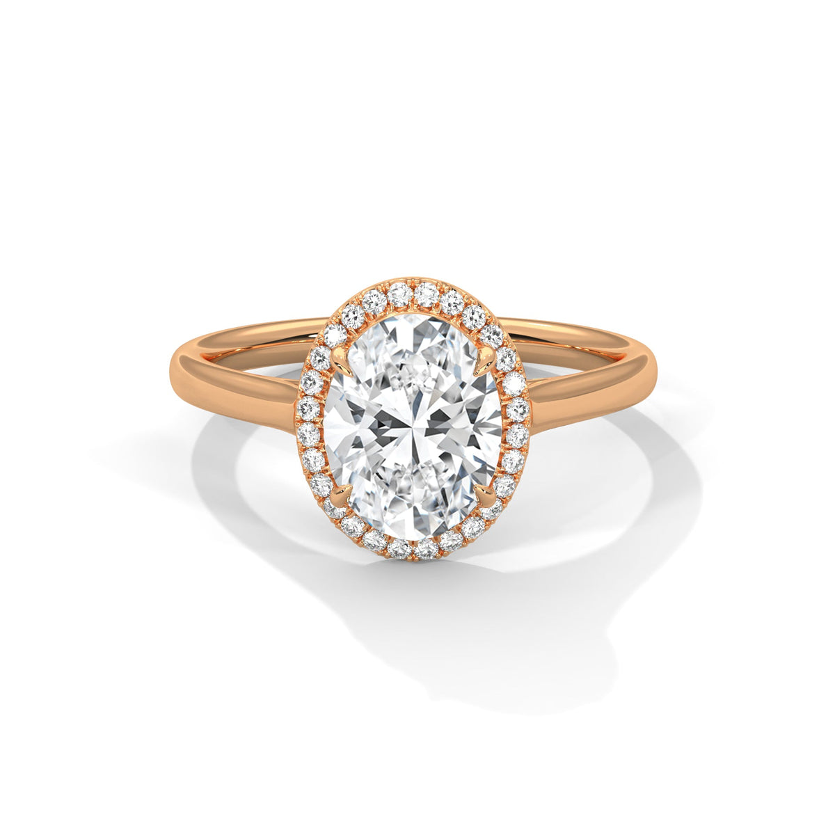 Rose gold ring with a large diamond on a white background 