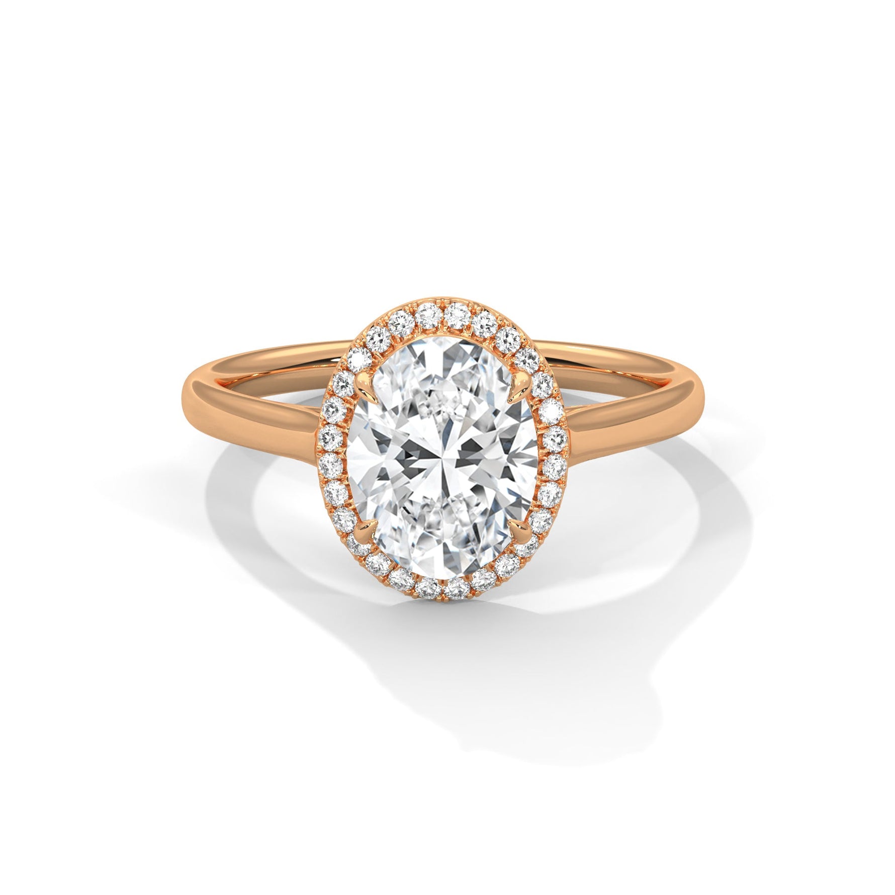 Rose gold ring with a large diamond on a white background #rose-gold