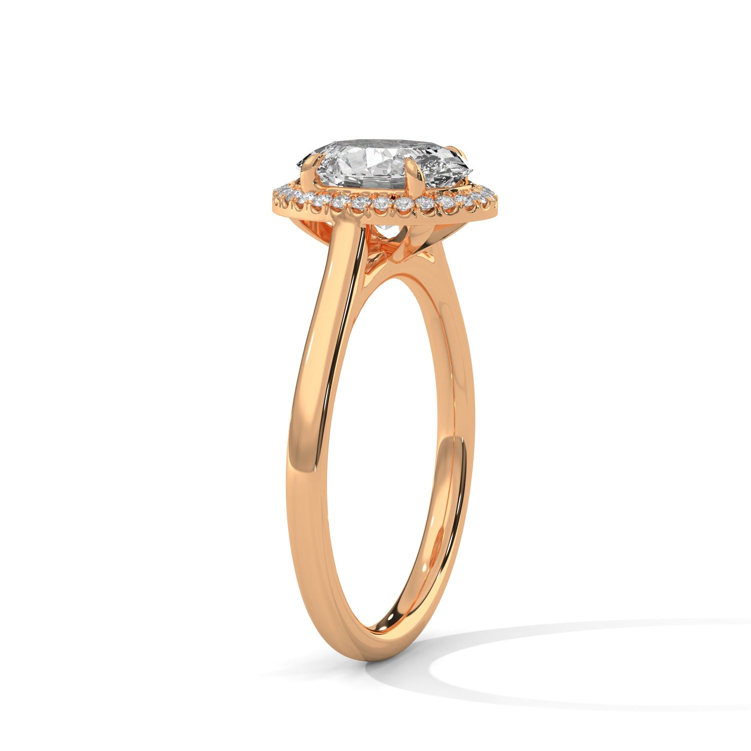 Rose gold ring with a large diamond on a white background 
