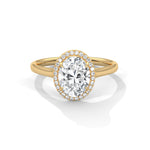 Gold ring with a large diamond on a white background 
