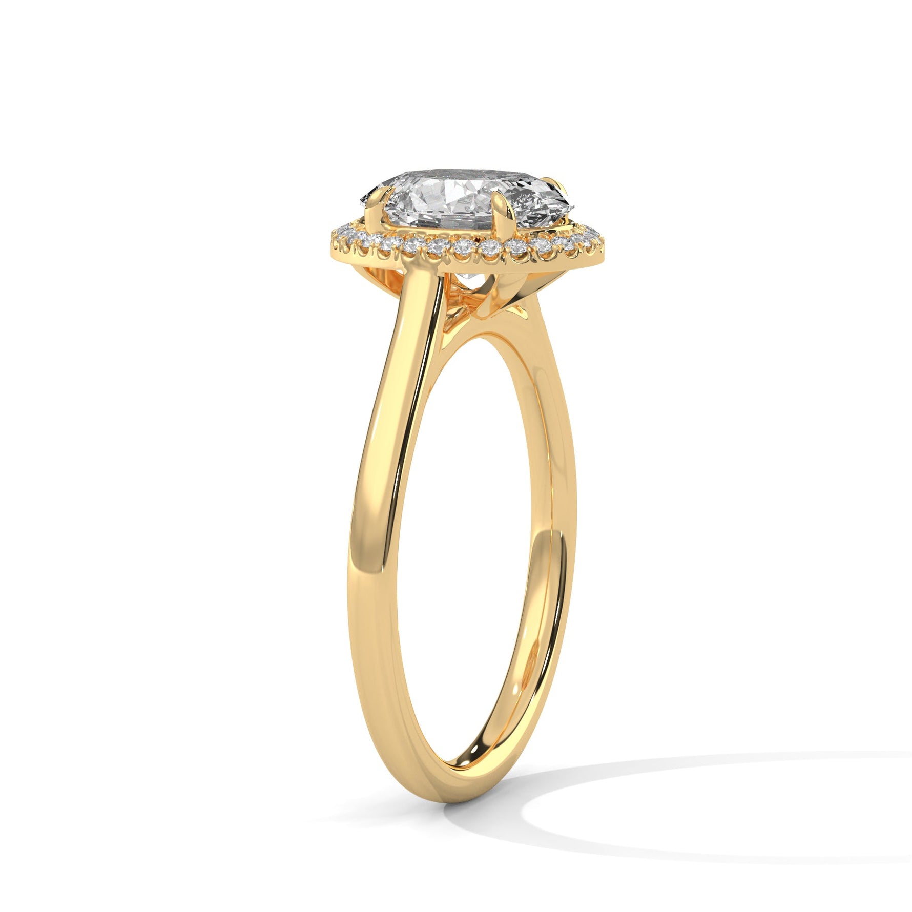 Gold ring with a large diamond on a white background 