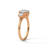 Rose gold ring with a large diamond on a white background 