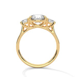 Gold ring with a large diamond on a white background 