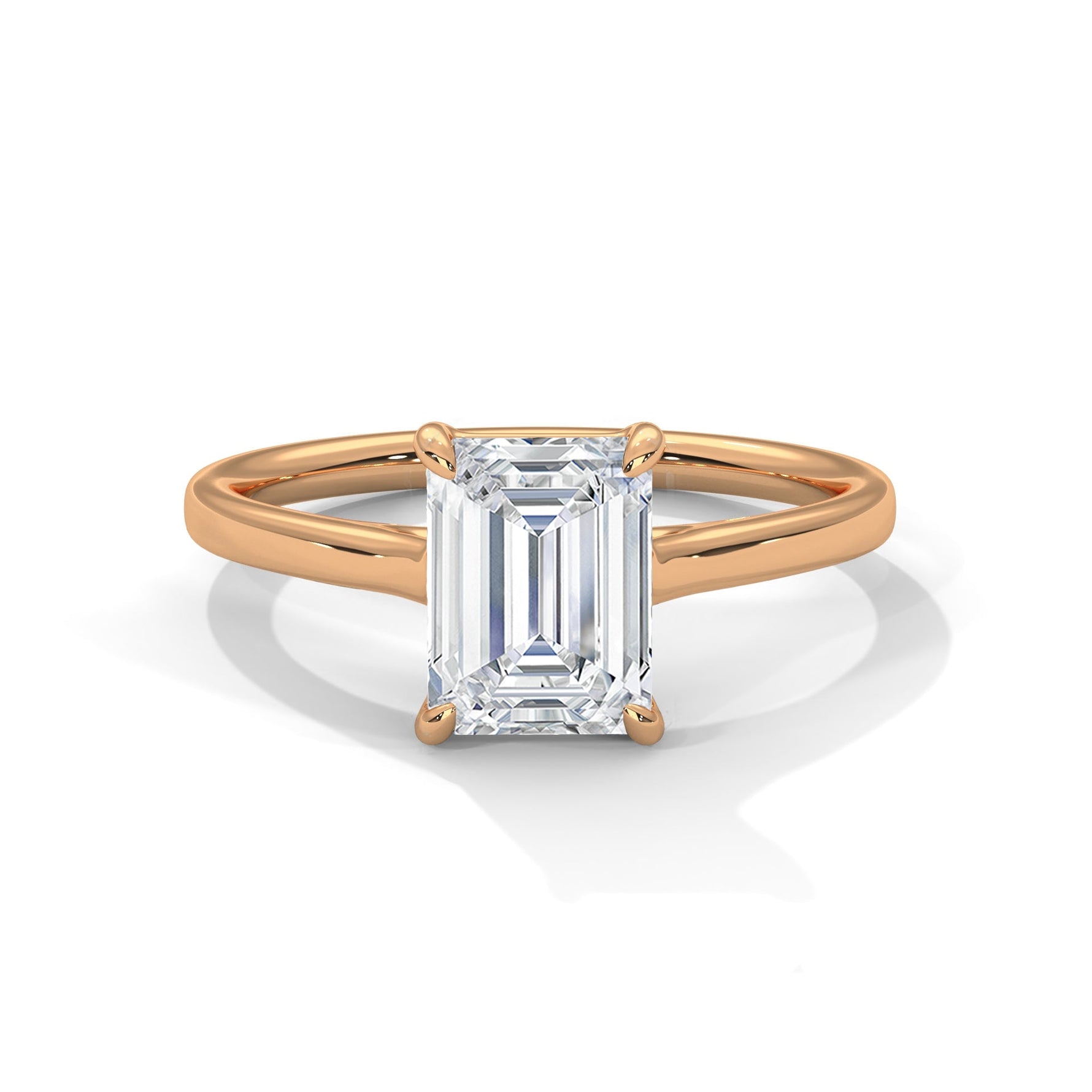 Rose gold ring with a large diamond on a white background #rose-gold