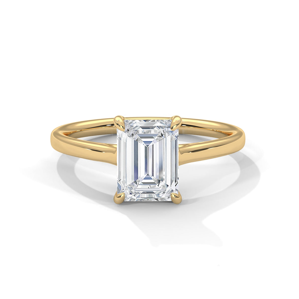 Gold ring with a large diamond on a white background 
