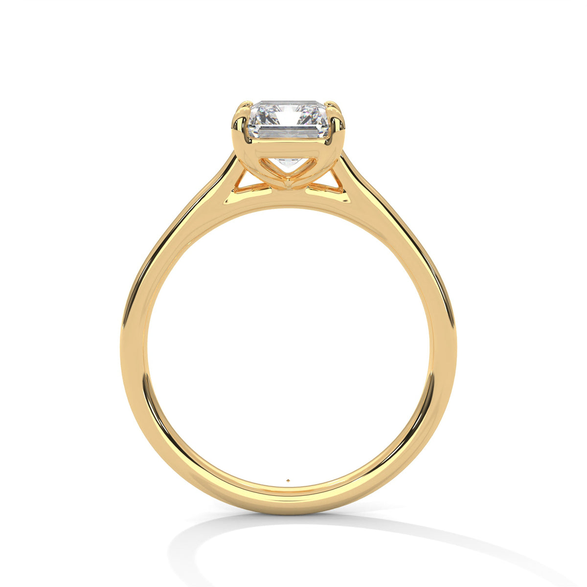 Gold ring with a large diamond on a white background 