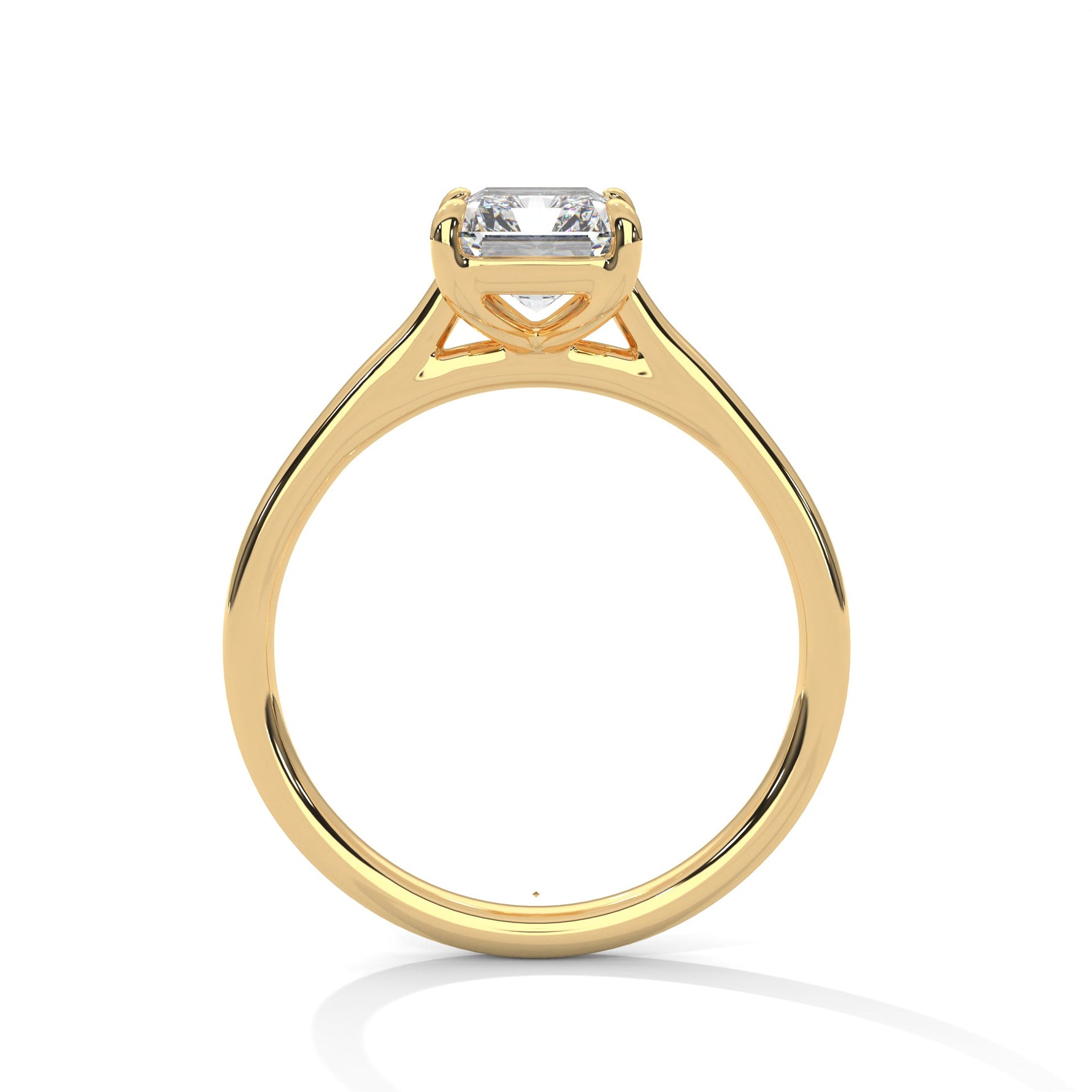 Gold ring with a large diamond on a white background 