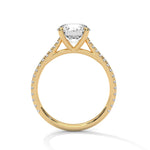 Gold ring with a large diamond on a white background 
