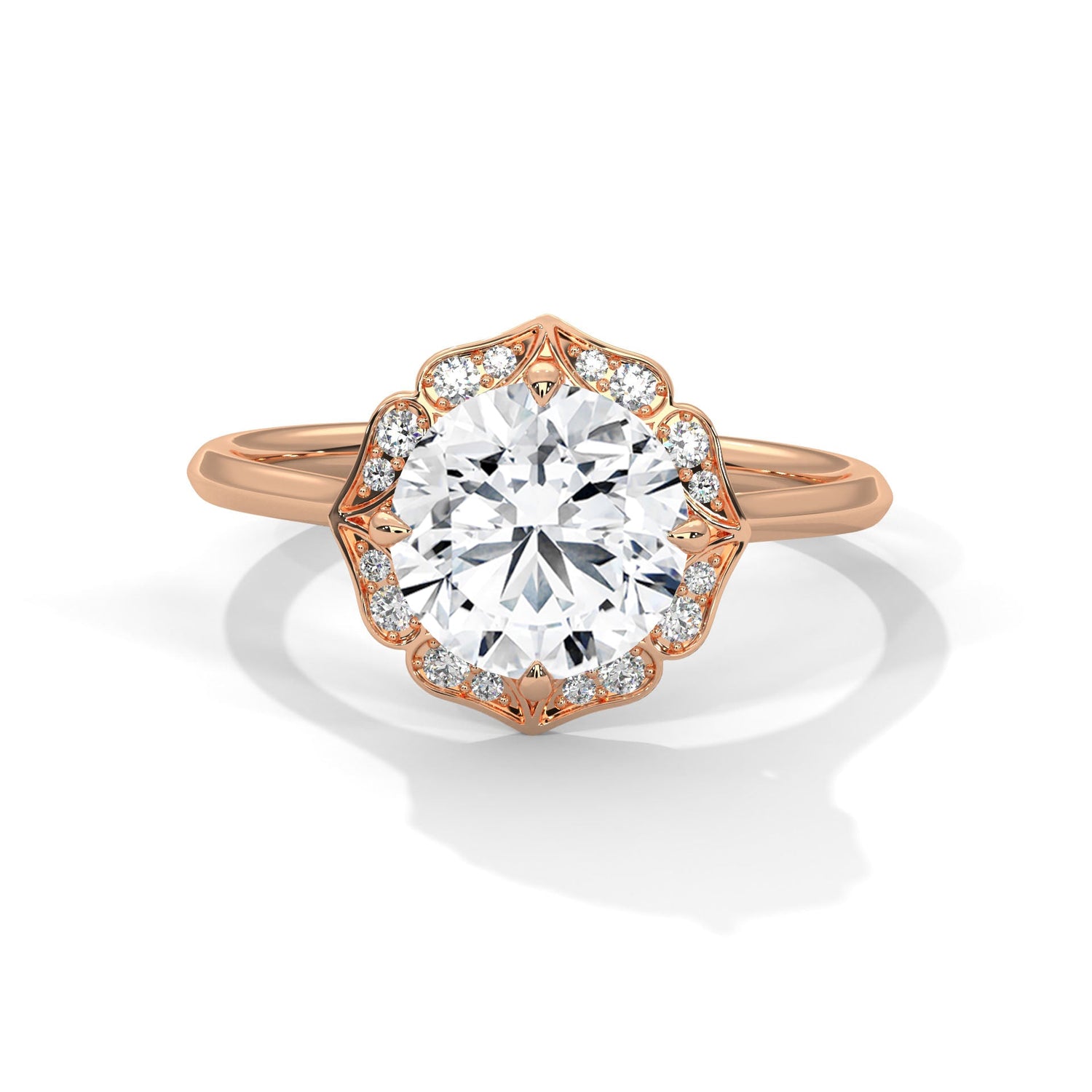 Rose gold ring with a large diamond on a white background 